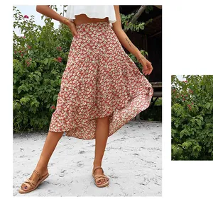Detailed view of the red floral print skirt featuring an irregular layered ruffle hemline