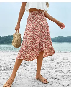 Outdoor shot of layered floral midi skirt in red chiffon with tiered ruffle hemline