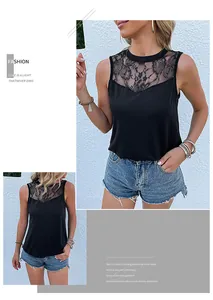 Dettaglio dell'inserto in pizzo floreale su un top smanicato nero aderente da donna