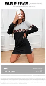 Detail of color-block tunic dress featuring leopard print panel and ribbed sleeve cuffs