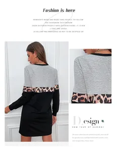 Detail of long sleeve dress featuring leopard print patchwork and a casual crew neck cut