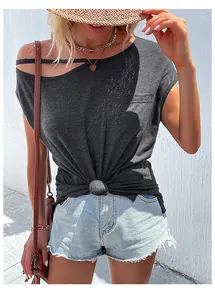 Detail of summer off-shoulder t-shirt with cut-out shoulder and stylish waist knot