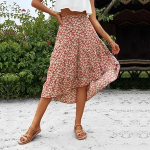 Bohemian orange floral high-waisted midi skirt with ruffle hem and irregular design