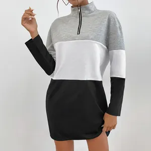 Women's color block sweatshirt with half-zip stand collar in grey, white, and black design