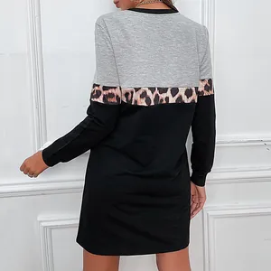Women's long sleeve color block dress with leopard print panel and grey knit top