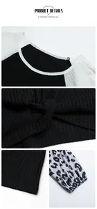 Detail of waffle knit fabric, leopard print cuffs and knotted hem on long sleeve top