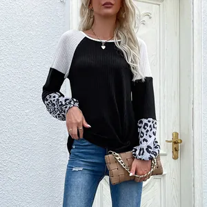 Women's color block waffle knit pullover with leopard print long sleeves and crew neck
