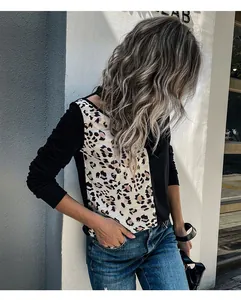 Detail of hollow out leopard print patchwork on long sleeve knit top for women