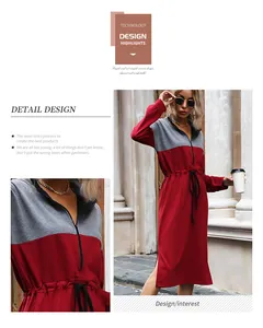 Detail of color-block dress showing drawstring waist and side slit in red and grey