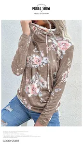 Détail du col montant à cordon et imprimé floral vintage sur sweat à manches longues femme