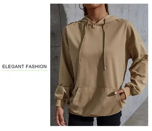 Detail of loose-fit women hoodie with kangaroo pocket and ribbed cuffs in khaki