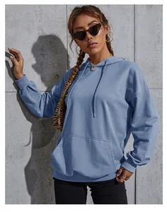 Detail of smog blue oversized hoodie with kangaroo pocket and ribbed cuffs for women