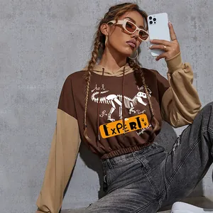 Women's cropped hoodie with dinosaur skeleton print and contrast raglan sleeves
