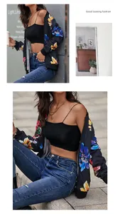 Detail of vintage floral print baseball jacket with zipper and retro streetwear style