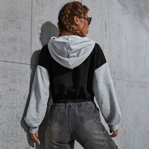 Women's cropped colorblock hoodie with grey sleeves and back view of street style fit
