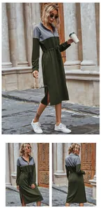 Detail view of contrast drawstring sweatshirt dress with side slits and half-zip collar