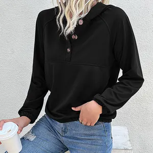 Women's black long sleeve hoodie with three-button neckline and raglan sleeves