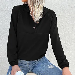Men's casual black drawstring hoodie featuring a buttoned henley neck and ribbed cuffs