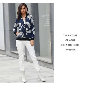 Detail of dark blue floral bomber jacket featuring ribbed collar and smooth front zipper