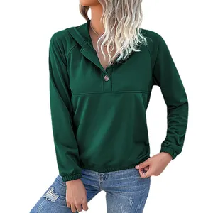 Dark green patchwork hoodie for women featuring button neckline and ribbed cuffs casual style