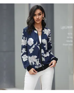 Detail of vintage floral print bomber jacket with ribbed collar and metal zipper