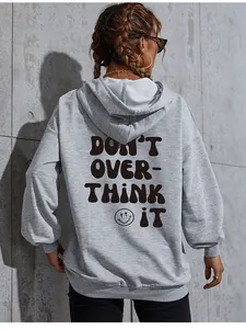 Detail view of light grey hoodie back with brown DON'T OVER-THINK IT puff print and smile