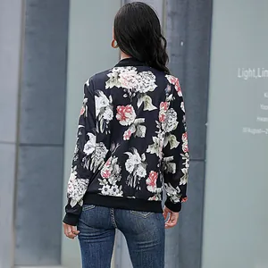 Women's vintage floral bomber jacket with ribbed cuffs and hem shown from the back view