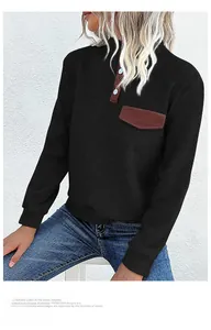 Detail of vintage quilted sweatshirt featuring button stand collar and brown contrast pocket