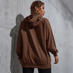 Oversized dark brown hoodie for women featuring a minimalist casual streetwear back view