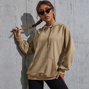 Oversized khaki hoodie for women featuring a drawstring hood and large kangaroo pocket