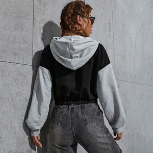 Women's cropped color-block hoodie with dropped shoulders and black-grey contrast