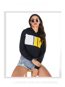 Detail of color block hoodie featuring navy blue, white, and yellow panels and drawstring