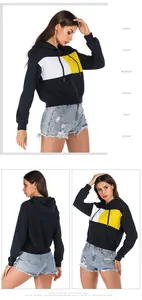 Three views of a navy color block cropped hoodie with studded denim shorts details