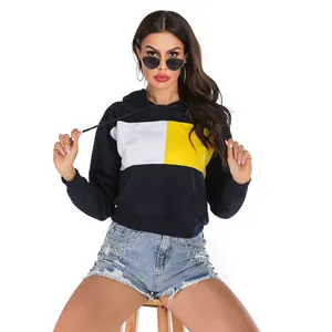 Women's color block drawstring hoodie with distressed studded denim shorts outfit