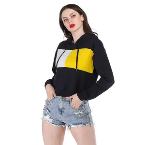 Women's casual color-block drawstring hoodie with yellow, white, and black patchwork design