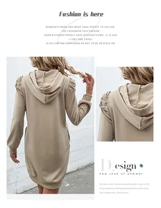 Detail view of khaki hooded sweatshirt dress featuring pleated puff sleeve shoulders