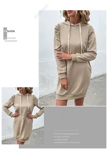 Detail of khaki long sleeve hoodie dress with puff shoulder sleeves and drawstring hood