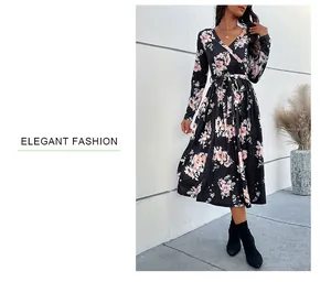 Detail view of floral midi dress with V-neckline, drawstring waist and elegant pink print
