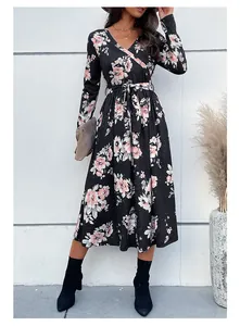 Detail of floral V-neck wrap dress with long sleeves and adjustable waist tie