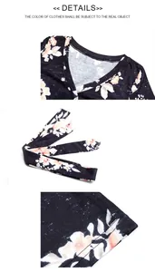 Detail view of V-neckline and matching floral belt on a long sleeve black midi dress