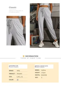 Detail view of high waisted grey joggers with drawstring waist and elastic cuffs for women