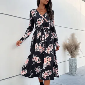 Women's V-neck long sleeve floral midi dress with black base and pink rose patterns