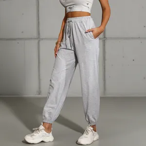 Women's light grey high waist joggers with elastic drawstring waist and cuffed hem