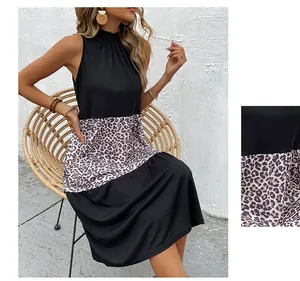 Detail view of leopard print stitching and breathable fabric on summer halter neck dress