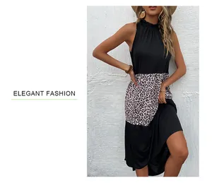 Detail of halter neck design and leopard print patchwork on summer sleeveless dress