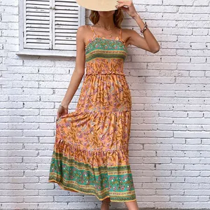 Bohemian floral cami dress with tiered ruffles and tropical print for summer