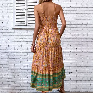 Bohemian summer maxi dress with tropical floral print and smocked open back design