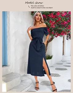 Detail of high-waist tie and side slit on this navy off-shoulder summer maxi dress