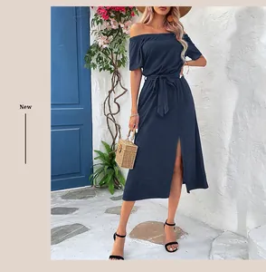 Detail of navy off-shoulder dress featuring a waist tie and sexy front slit for summer