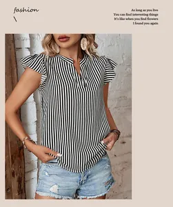 Detail of V-neck summer blouse featuring vertical stripes and layered ruffle cap sleeves